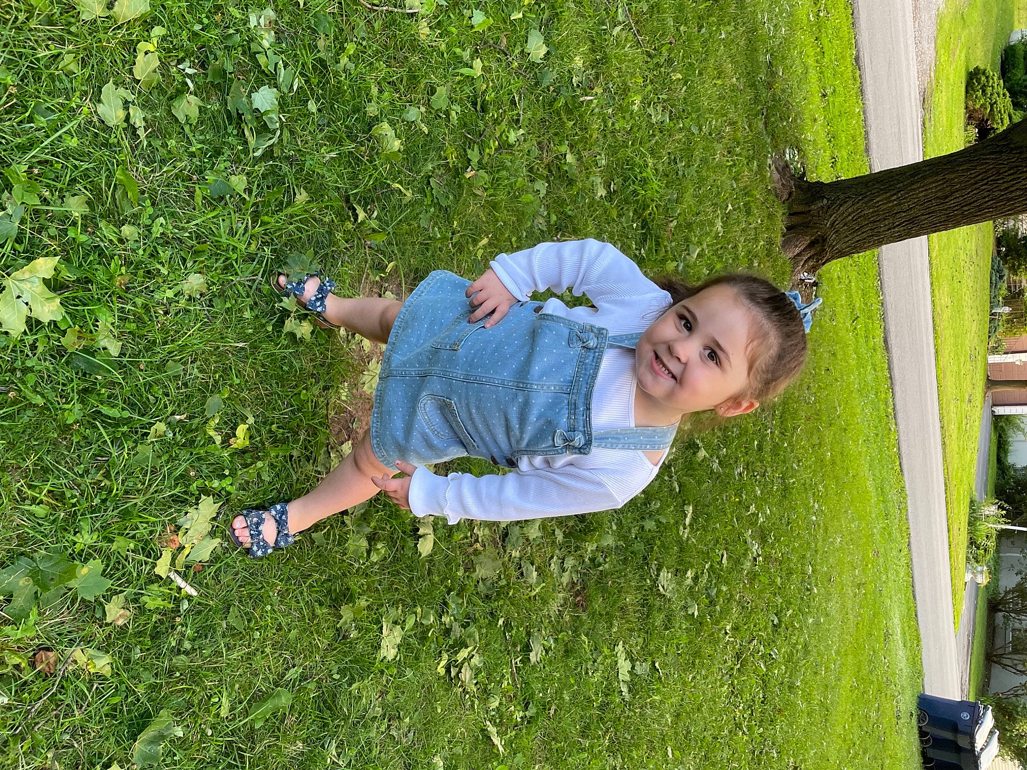 Gianna is registered to the contest to win money with this photo: botany, child, electric_blue, fun, grass, grass_family, grassland, groundcover, happy, joy, lawn, leisure, meadow, natural_environment, people_in_nature, person, plant, recreation, shorts, smile