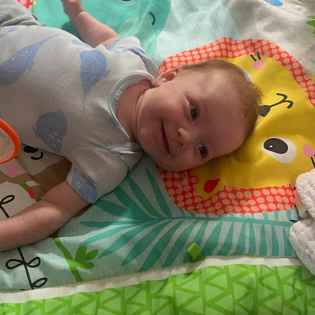 Nova is registered to the contest to win money with this photo: baby, bed, blanket, clothing, crib, cushion, diaper, face, furniture, head, homedecor, infantbed, mat, newborn, person, photography, portrait, quilt, sleeping, t_shirt