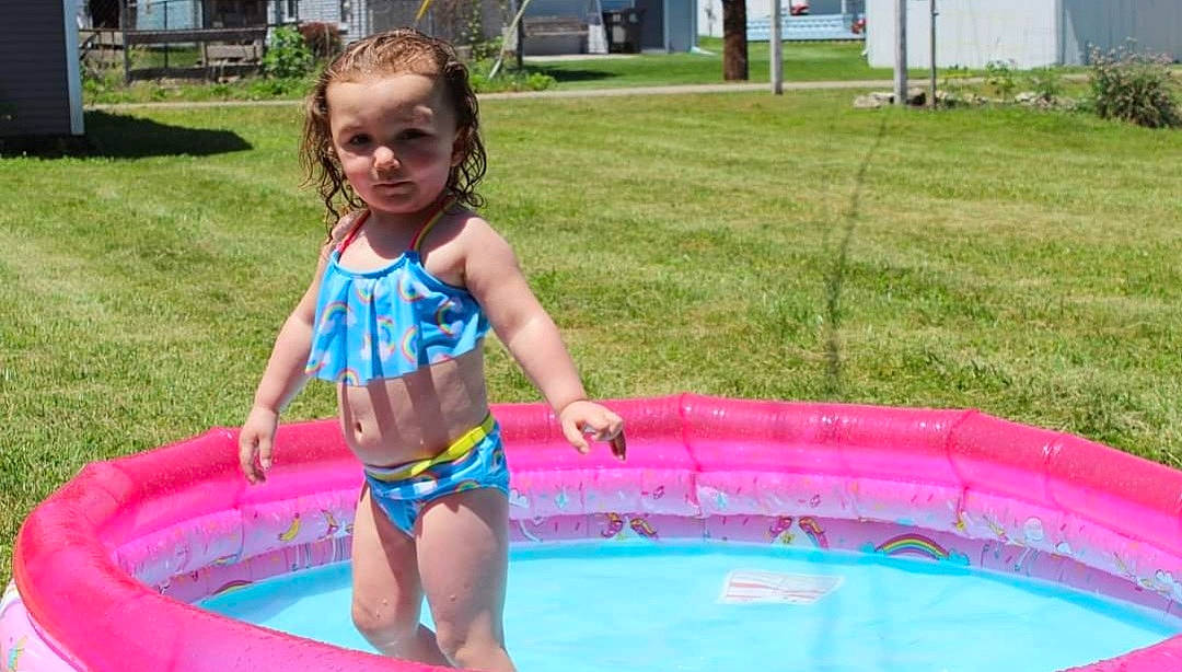 Kenlee joined the competition — help win amazing prizes! aqua, backyard, barefoot, bathing, beauty, child, fluid, fun, garden, inflatable, lawn, leisure, person, pink, play, recreation, summer, swimwear, toddler, toe