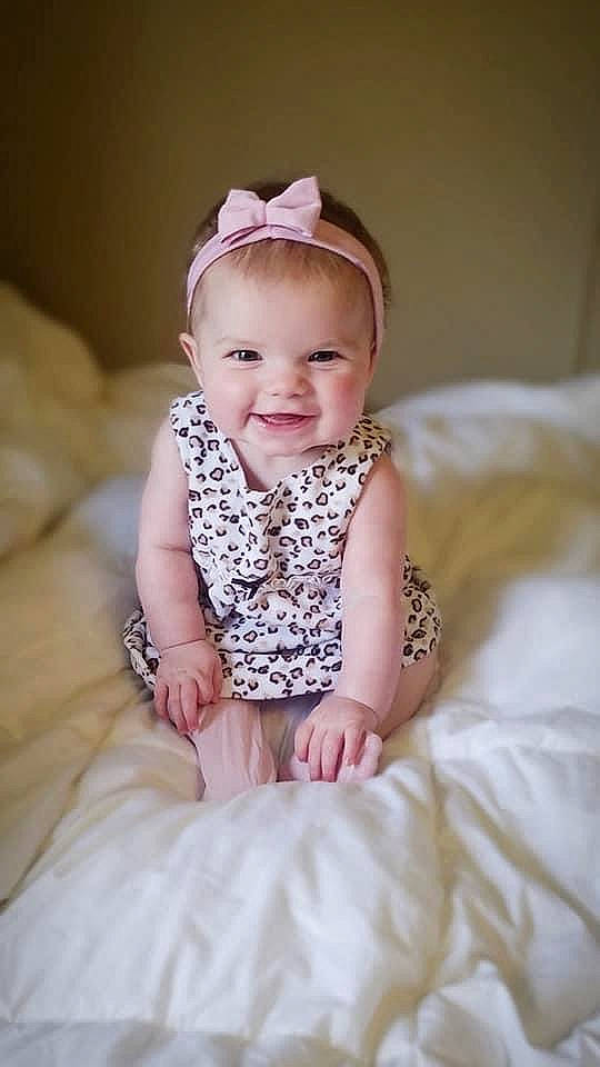 Averie joined the competition — help win amazing prizes! baby, baby_toddler_clothing, child, chin, clothing, comfort, dress, eye, face, flash_photography, happy, head, headband, iris, joy, lip, person, pink, skin, sleeve