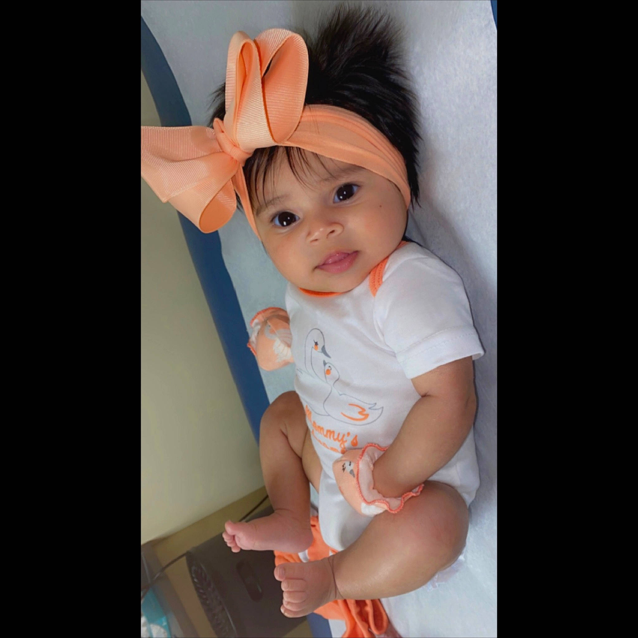 Yoareliz is registered to the contest to win money with this photo: arm, baby, baby_toddler_clothing, bangs, cheek, child, eyelash, fashion_accessory, flash_photography, gesture, happy, headwear, helmet, iris, lip, person, portrait_photography, sitting, sleeve, t_shirt