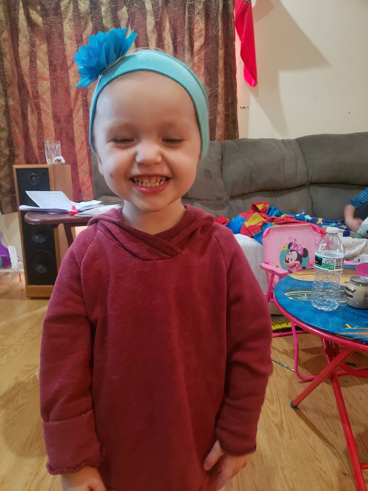 Arianna is registered to the contest to win money with this photo: child, face, hair_accessory, head, headband, headgear, headwear, joy, person, smile, toddler
