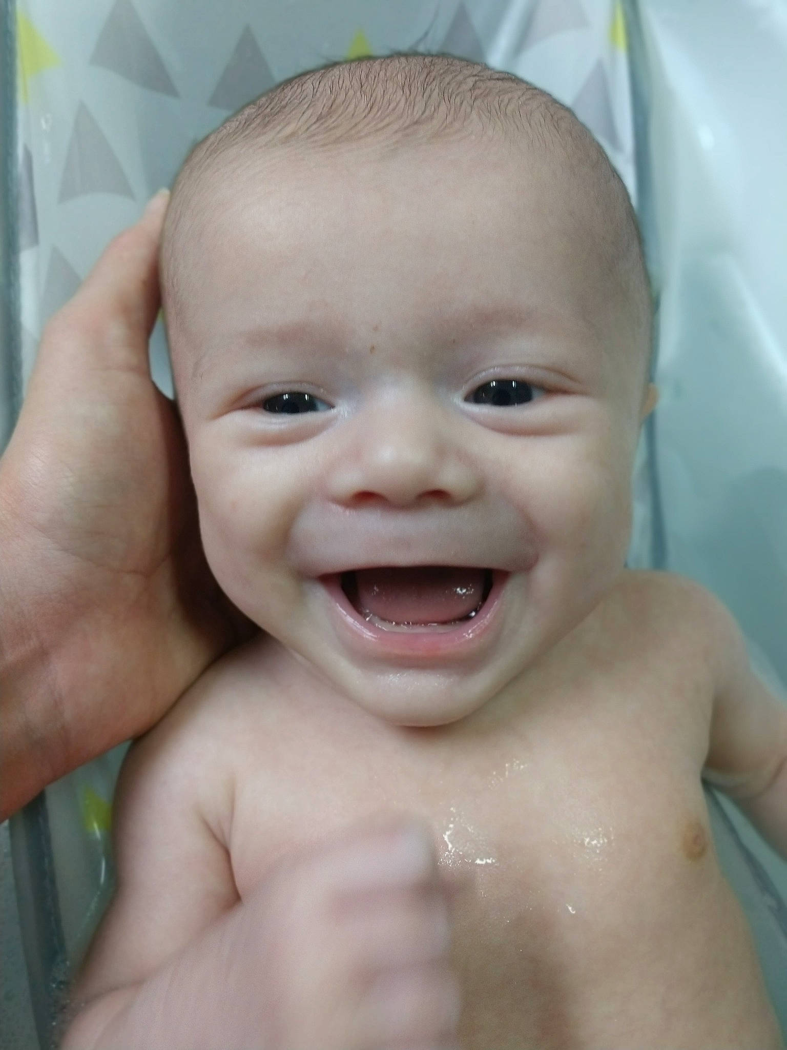 Rex is registered to the contest to win money with this photo: bathing, boy, cheek, child, chin, close_up, face, forehead, head, infant, jaw, joy, laughter, lip, mouth, nose, person, skin, smile, tooth