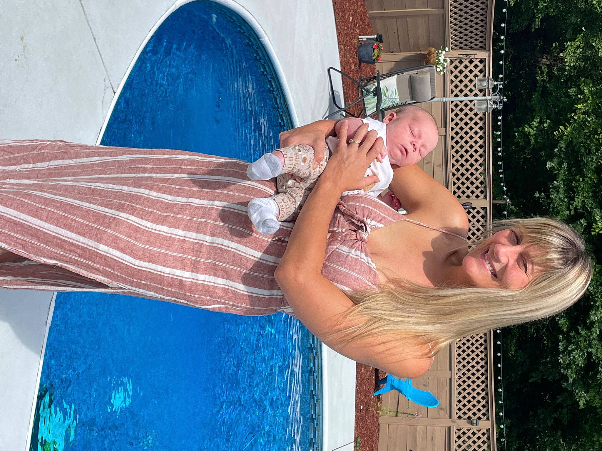 Mason is registered to the contest to win money with this photo: abdomen, barechested, chest, elbow, flesh, fun, happy, human_leg, joy, leisure, muscle, person, smile, summer, sun_tanning, swimming_pool, thigh, tree, trunk, vacation