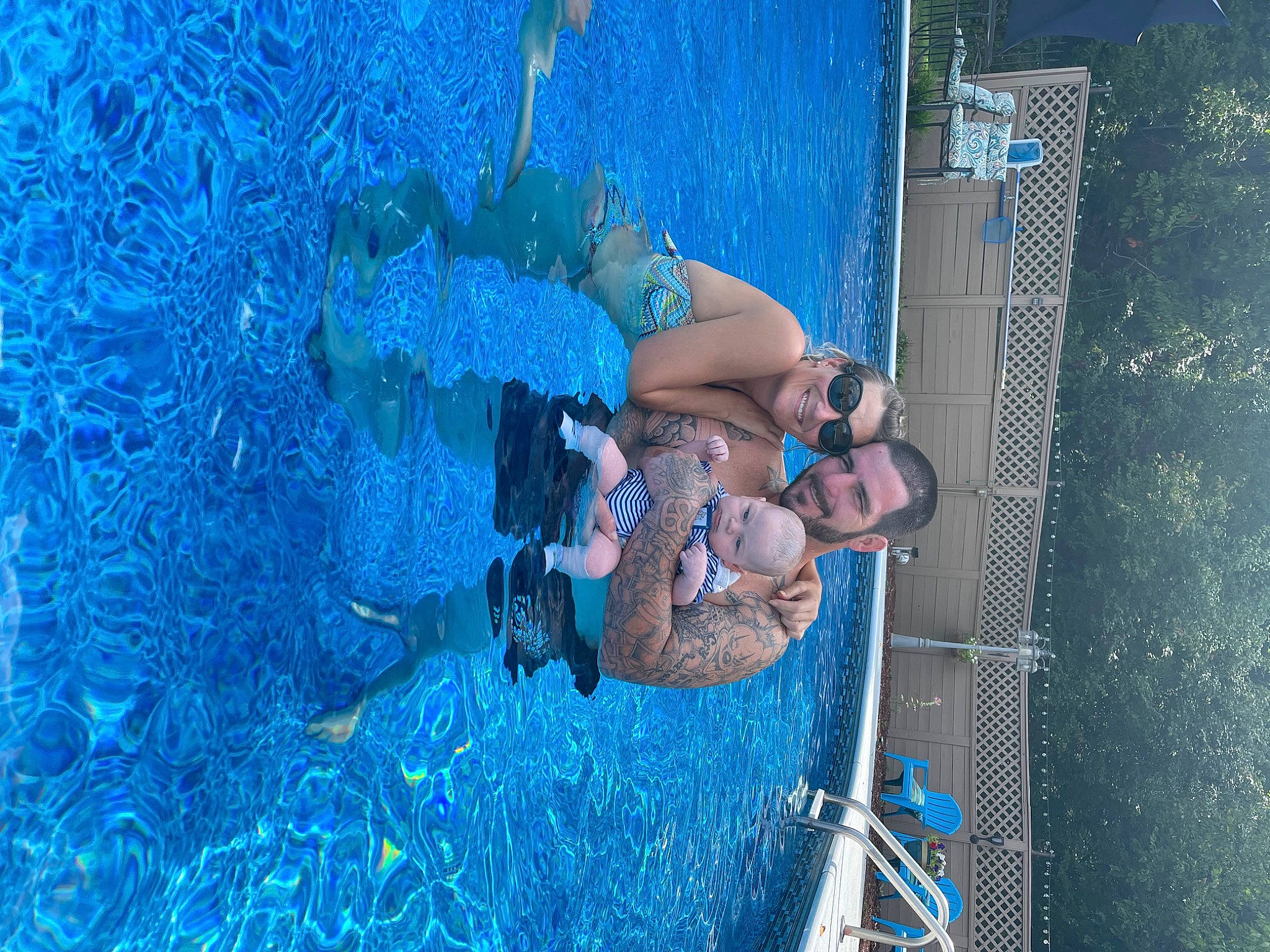 Mason is registered to the contest to win money with this photo: adventure, blue, elbow, electric_blue, fun, joy, leisure, person, recreation, rope, swimming_pool, vacation, water, wire