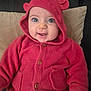 baby, infant, child, hoodie, red_hoodie, knitwear, cute, big_eyes, smile, sitting, pillow, couch, eyelashes, button, pocket, hand, cozy, portrait, indoor, fabric