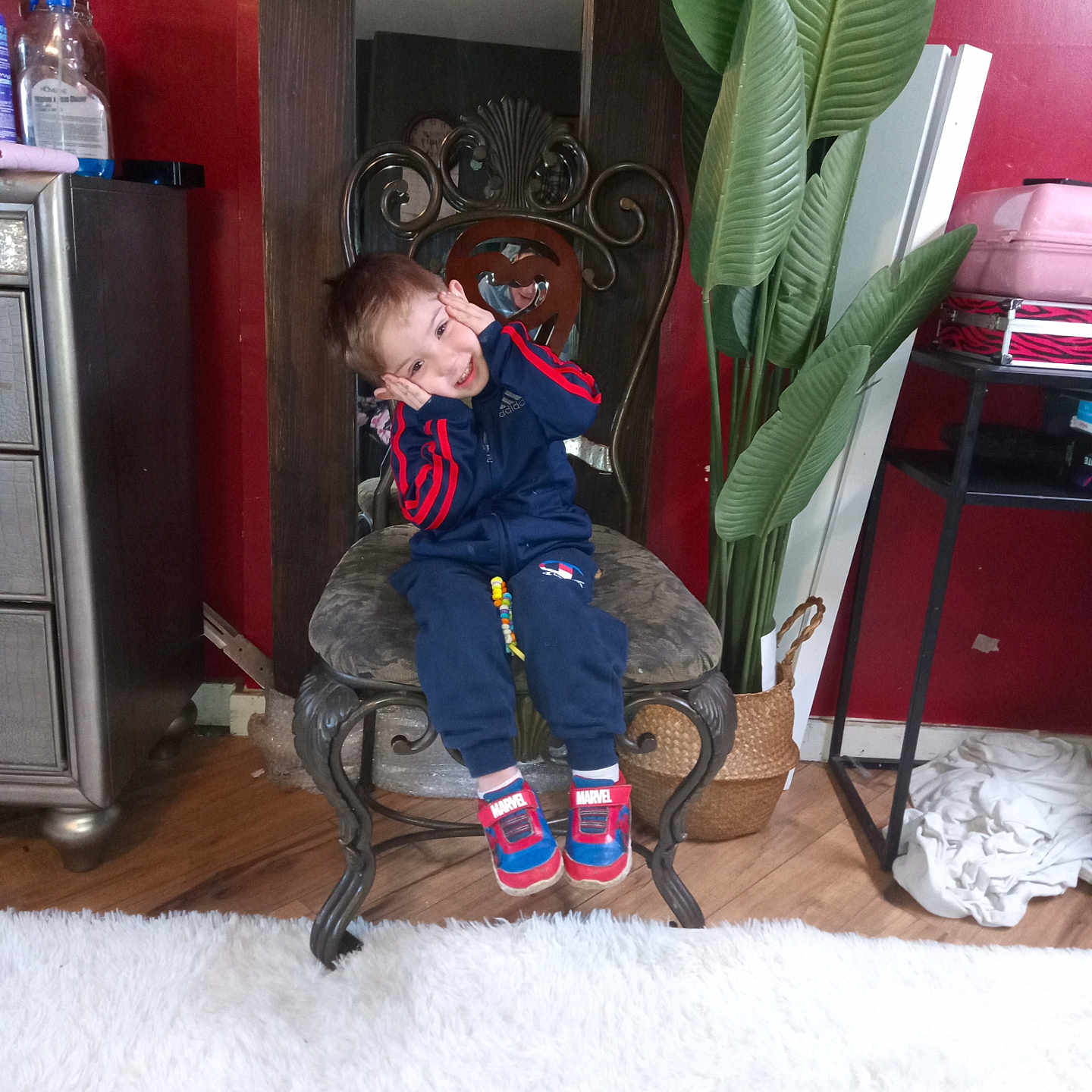 Everett joined the competition — help win amazing prizes! baby, cabinet, clothing, coat, drawer, face, footwear, furniture, homedecor, indoors, interiordesign, jacket, pants, person, plant, plywood, rug, shoe, sitting, wood