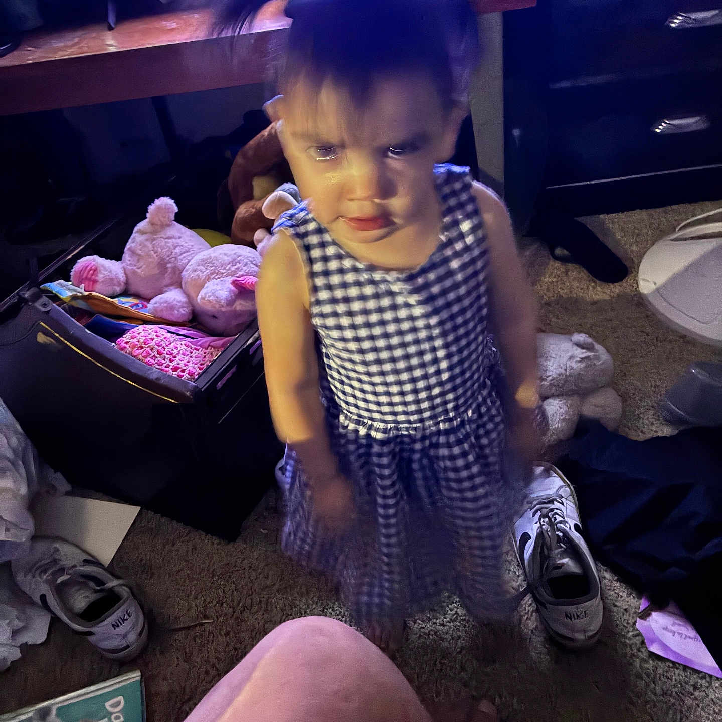 Katalayiah is registered to the contest to win money with this photo: child, girl, dress, indoor, room, toys, stuffed_animal, shoes, carpet, book, furniture, cabinet, television, blur, motion_blur, messy, floor, pigtails, clothing, portrait