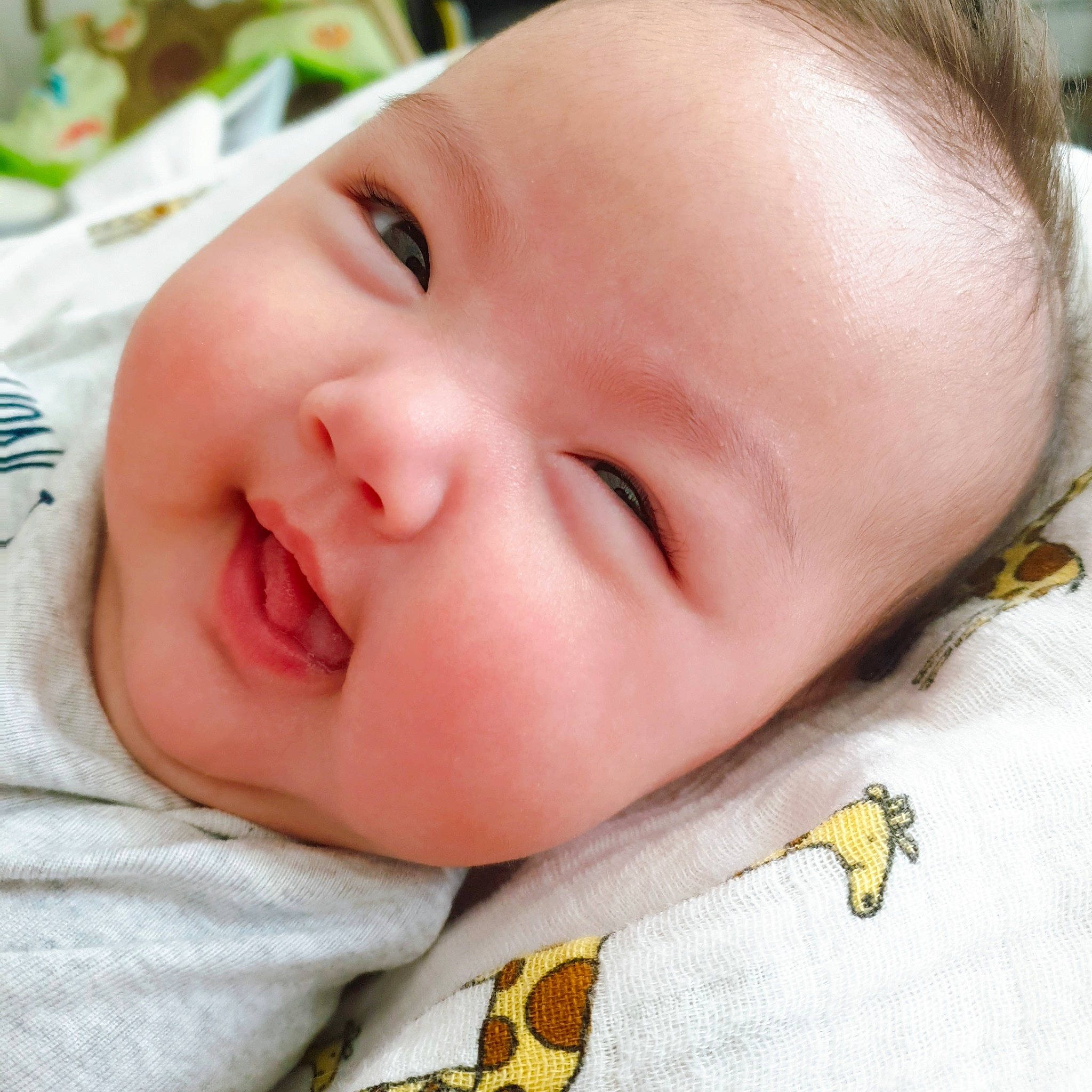 Jamie joined the competition — help win amazing prizes! baby, baby_products, baby_sleeping, baby_toddler_clothing, cheek, child, close_up, comfort, eyebrow, eyelash, happy, iris, linens, lip, mouth, nose, pattern, person, skin, smile