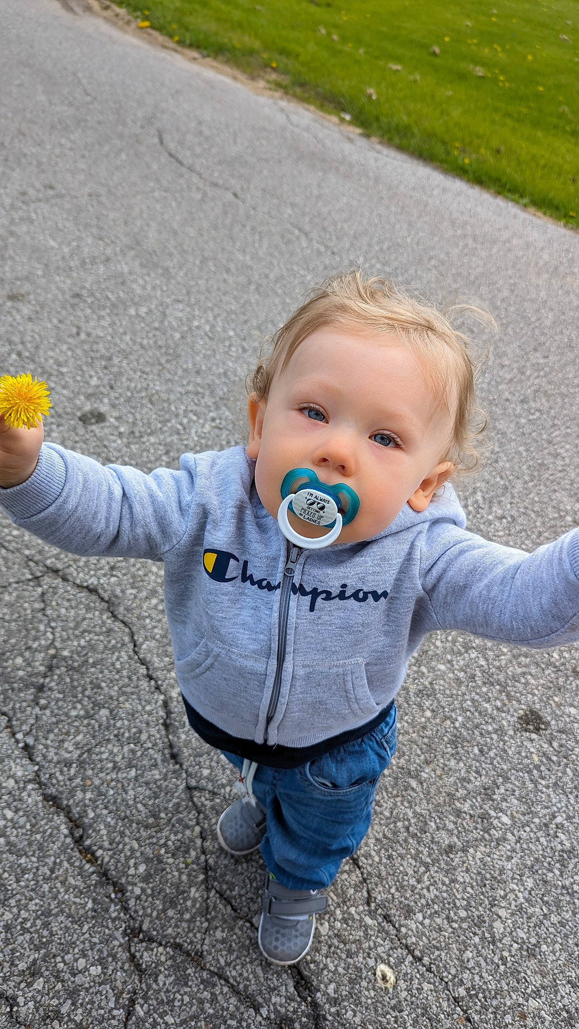 Lee joined the competition — help win amazing prizes! asphalt, baby, baby_toddler_clothing, child, denim, eye, facial_expression, flower, fun, grass, hairstyle, happy, head, jeans, leaf, person, public_space, road_surface, sitting, sleeve