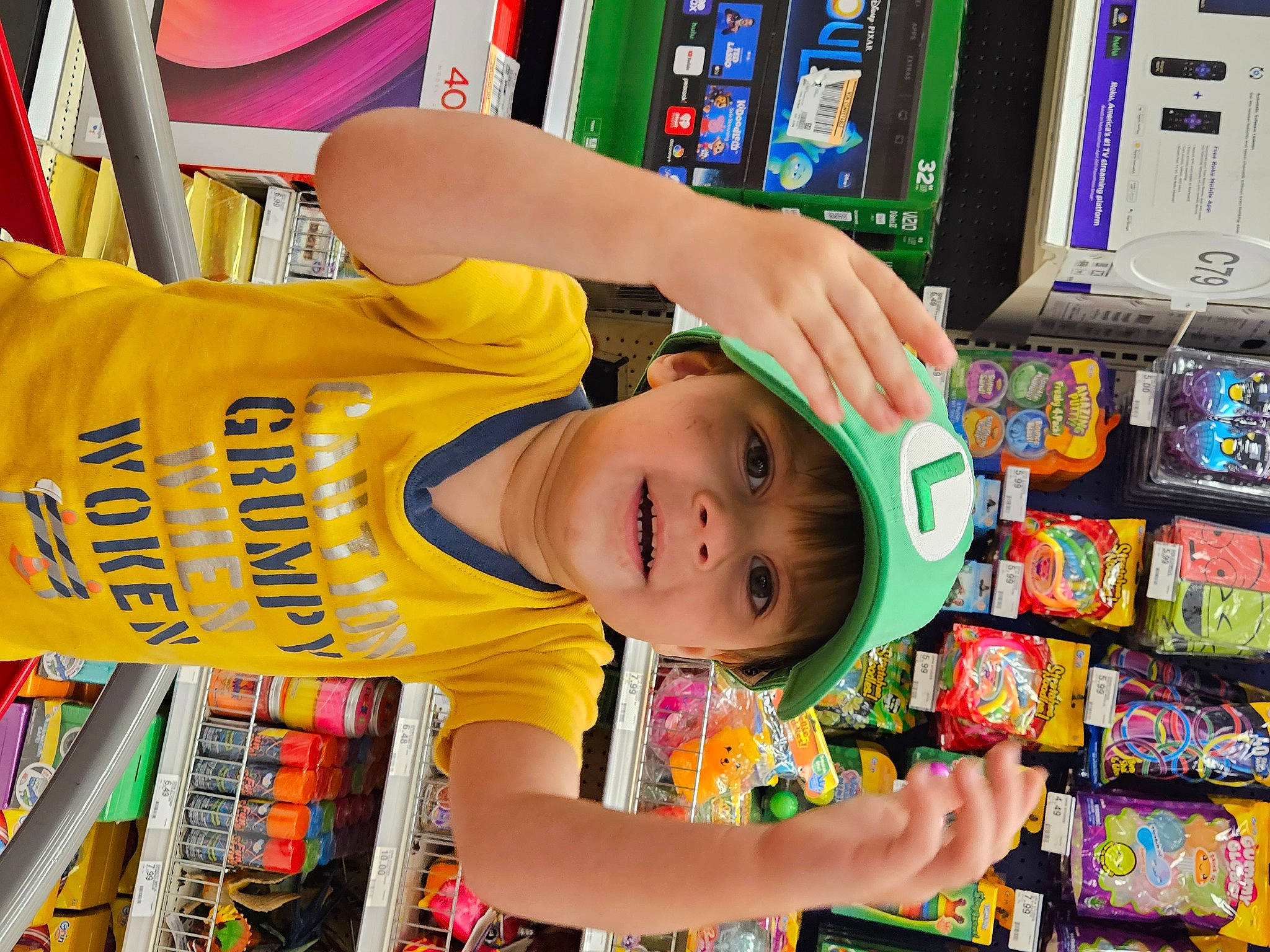 Jason joined the competition — help win amazing prizes! arm, bookcase, child, convenience_store, customer, fun, grocery_store, happy, headwear, leisure, people, person, play, publication, retail, room, shelf, smile, snapshot, t_shirt