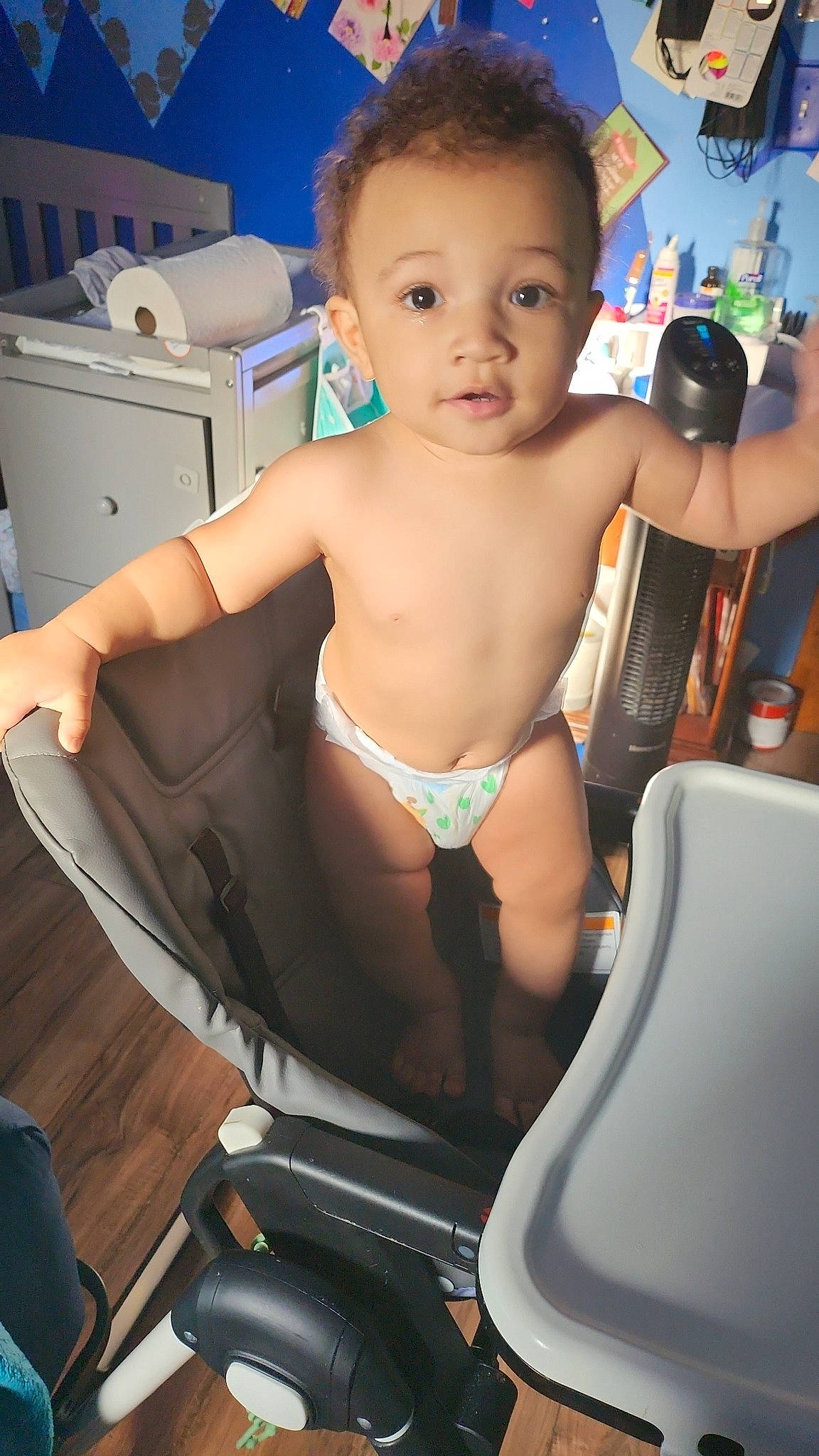 Jayceon is registered to the contest to win money with this photo: abdomen, baby, chair, cheek, chest, comfort, elbow, eye, eyelash, face, head, human_leg, joint, person, shoulder, skin, stomach, thigh, thumb, toddler