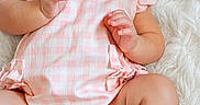 Rylee joined the competition — help win amazing prizes! baby, baby_clothes, checkered_pattern, child, cute, fluffy_rug, hands, happy, headwear, indoors, infant, legs, one_person, pink_headband, pink_outfit, portrait, sitting, skin, smile, soft_texture