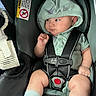 Desmond Dos joined the competition — help win amazing prizes! baby, car_seat, child, chubby_cheeks, clothing, comfort, cute, dinosaur_design, fan, hoodie, indoor, infant, looking_sideways, mint_green, portrait, safety, seatbelt, socks, straps, young_child