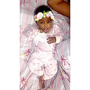 Rena'E-Loreal joined the competition — help win amazing prizes! baby, child, pajamas, blanket, unicorn, flower_crown, face, hand, feet, bed, sleepwear, lying_down, cute, indoors, person, infant, soft_toys, patterned_clothing, pink, striped_bedding