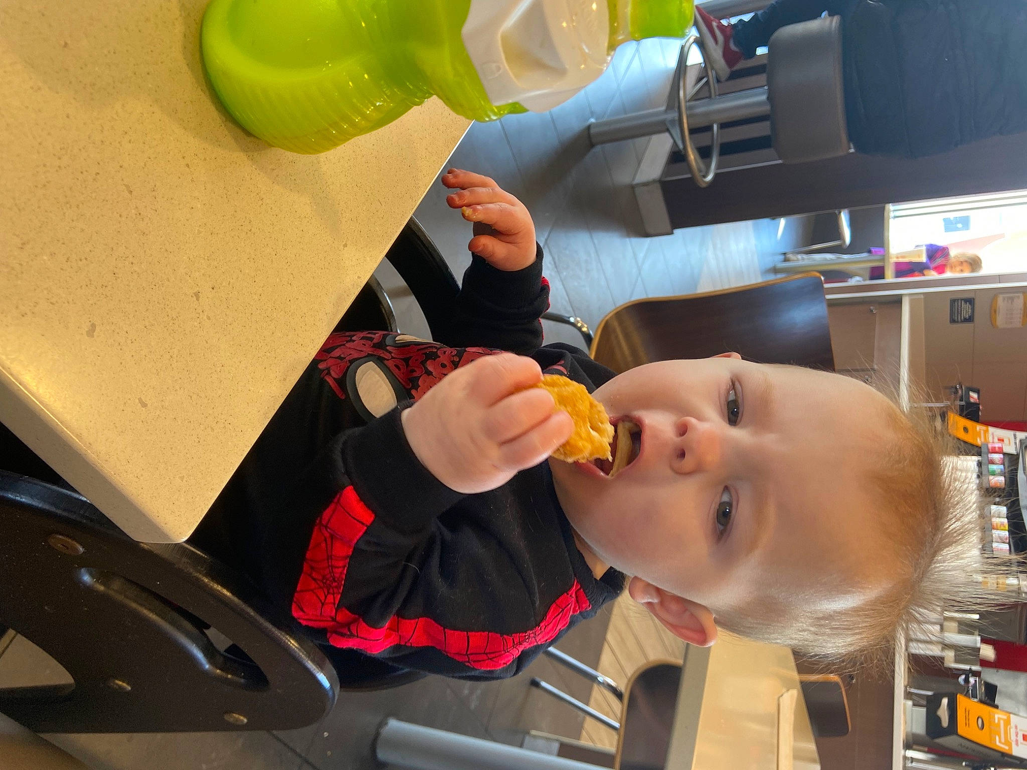 Jameson is registered to the contest to win money with this photo: aerospace_engineering, automotive_design, baby, bookcase, child, engineering, finger, fun, gesture, home_appliance, machine, person, personal_protective_equipment, plastic, room, service, shelf, shelving, tableware, toddler