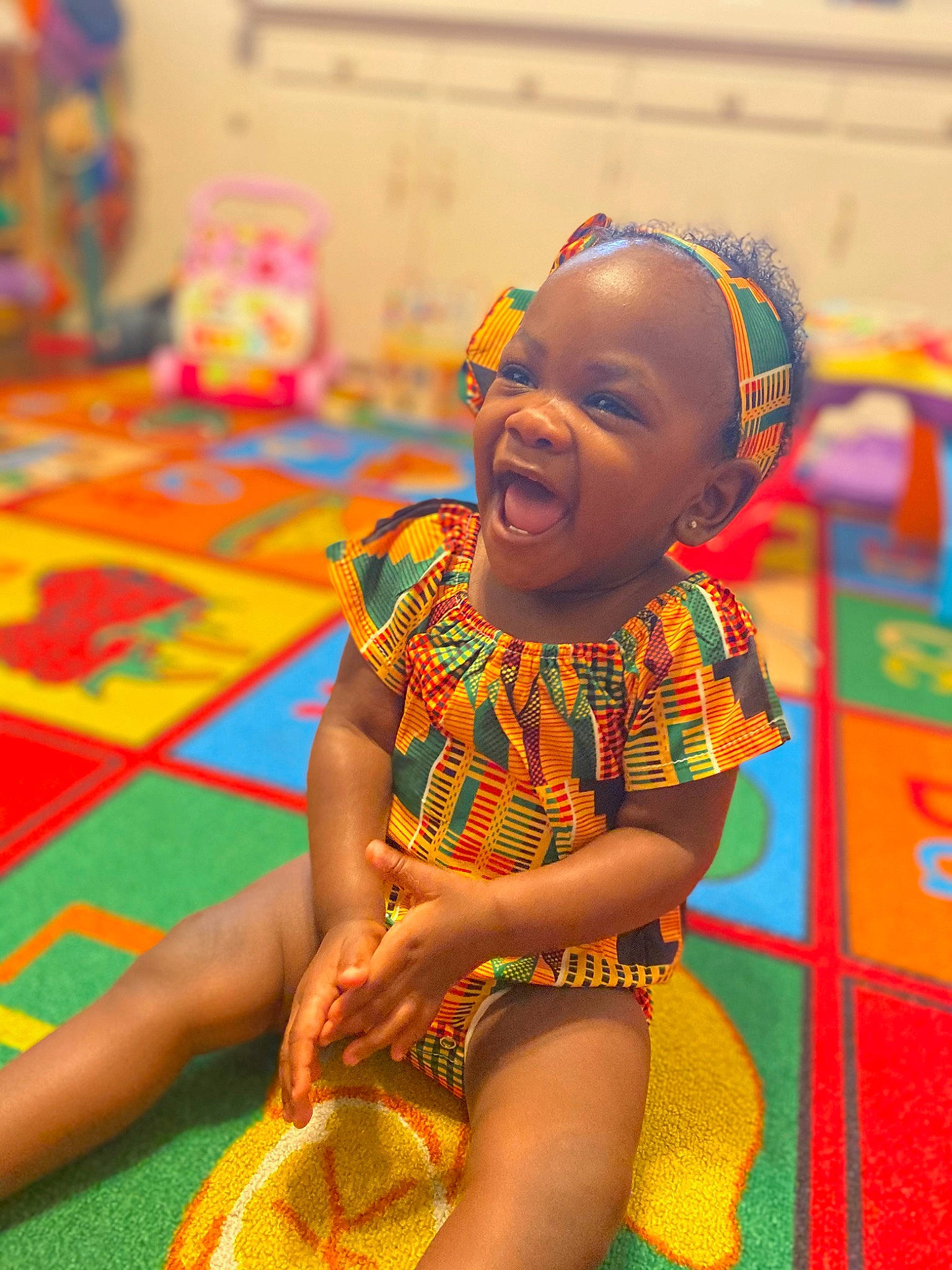 Zara is registered to the contest to win money with this photo: adaptation, art, child, eye, fun, happy, person, play, sitting, skin, smile, toddler, yellow