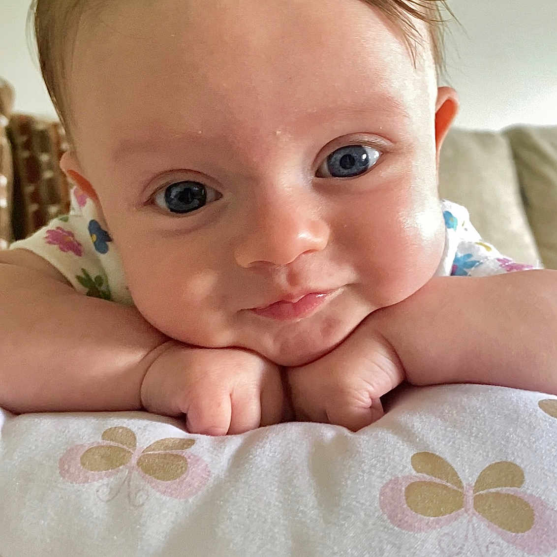 Raya is registered to the contest to win money with this photo: baby, bed, bedroom, bodypart, couch, cushion, face, finger, furniture, hand, happy, head, homedecor, indoors, newborn, person, photography, portrait, room, smile