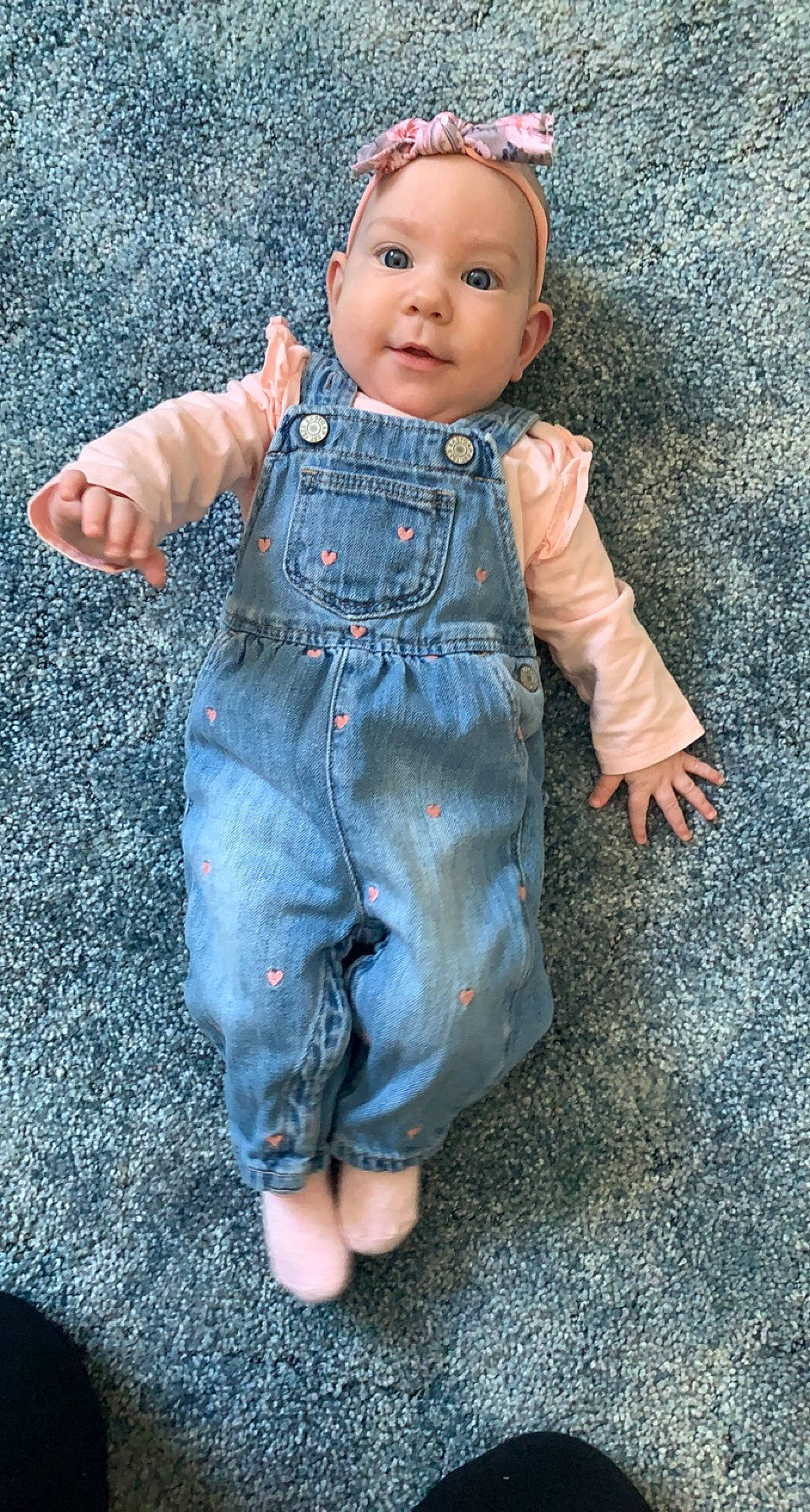 Adyson joined the competition — help win amazing prizes! baby_toddler_clothing, barefoot, button, cheek, denim, doll, dress_shirt, electric_blue, eye, finger, gesture, head, headwear, iris, pattern, person, skin, sleeve, thumb, toy