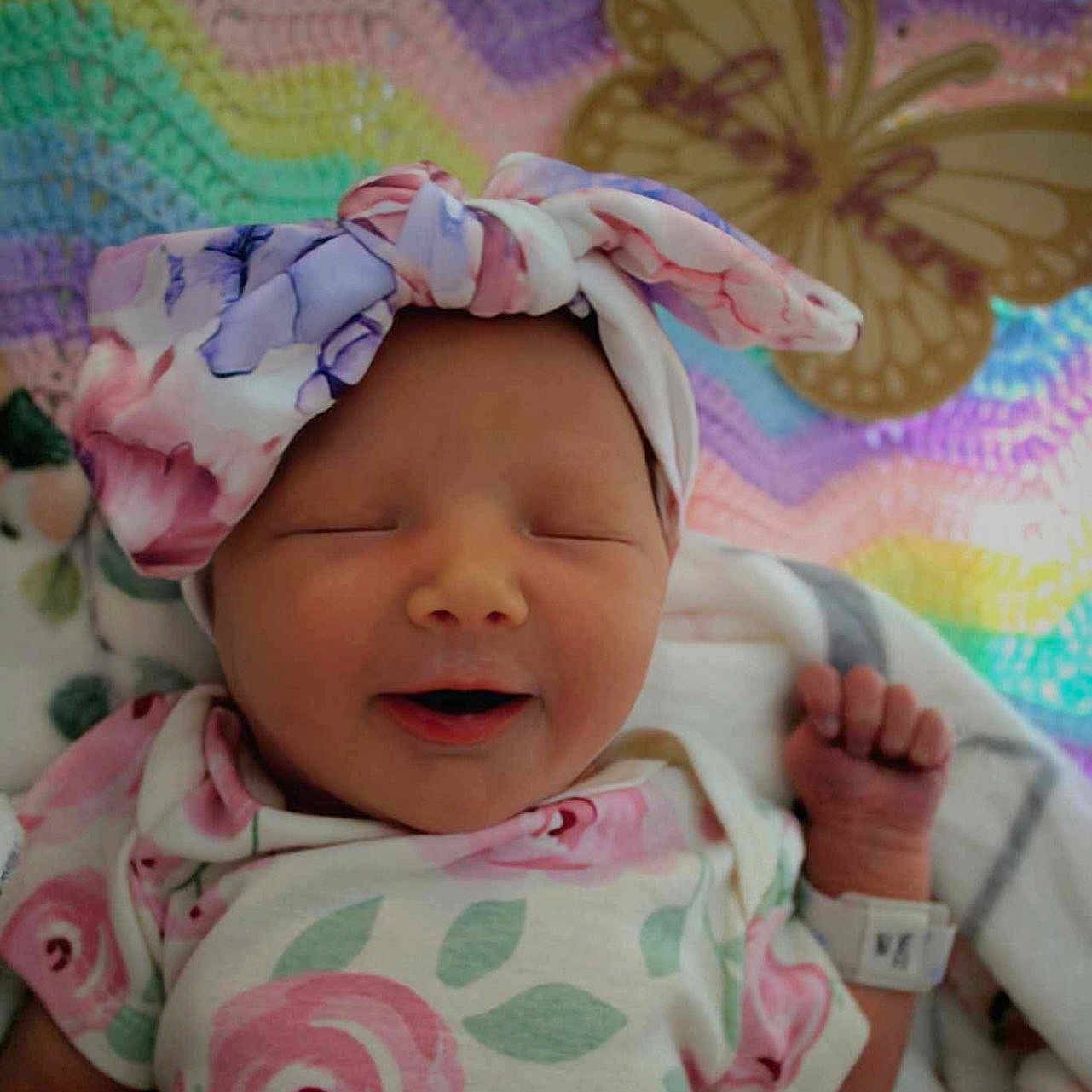 Aveline is registered to the contest to win money with this photo: architecture, baby, bed, blanket, building, clothing, cushion, face, furniture, glove, hat, head, homedecor, hospital, newborn, person, photography, portrait, quilt, sleeping