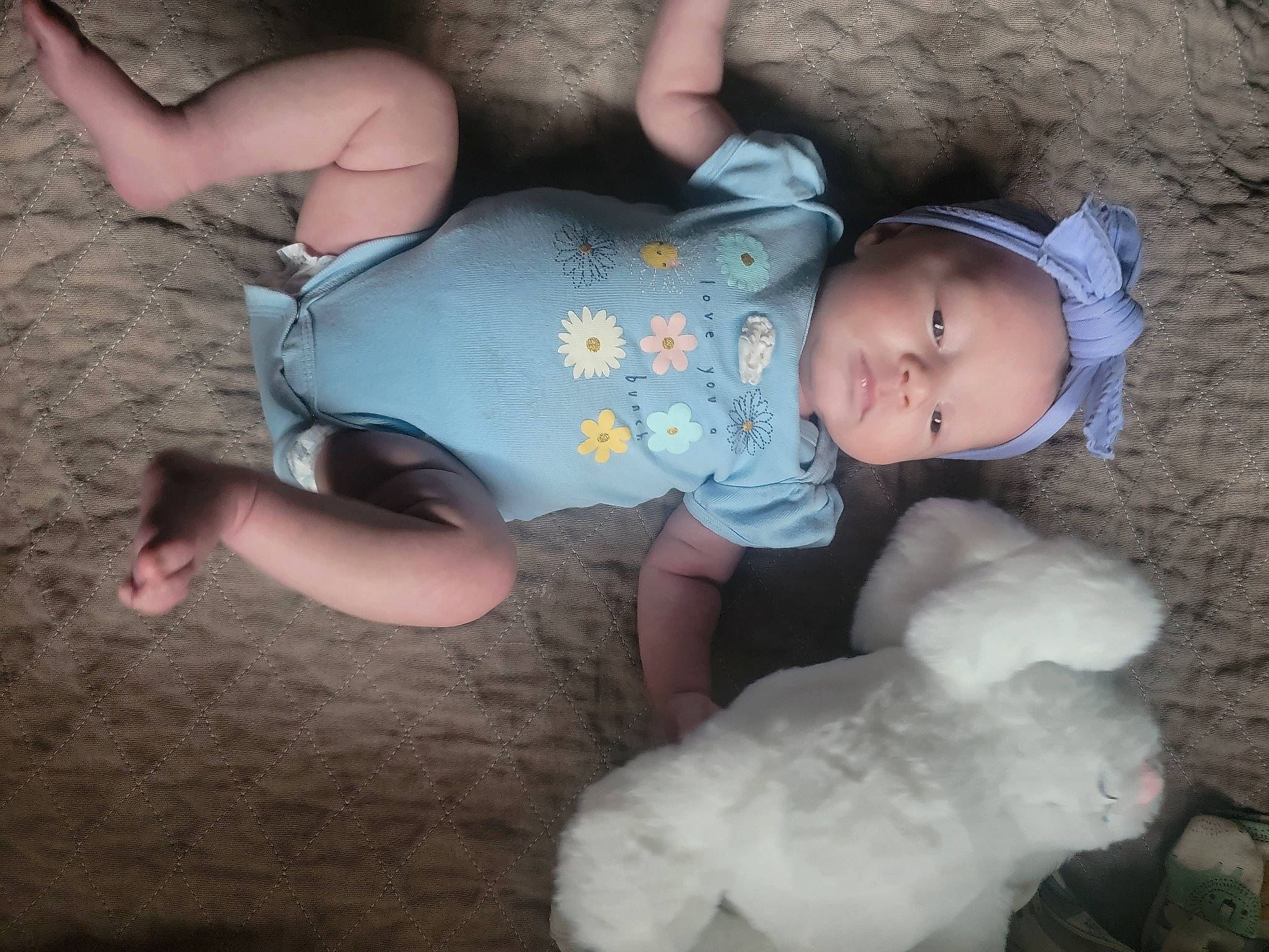 Lailah is registered to the contest to win money with this photo: abdomen, baby, baby_toddler_clothing, child, finger, foot, fun, grass, happy, human_body, human_leg, leg, mammal, person, sitting, skin, thigh, toddler, tree, trunk