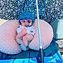 Lakelyn joined the competition — help win amazing prizes! baby, sunglasses, hat, umbrella, neck_pillow, beach_chair, feet, smile, outdoor, summer, sun_protection, floral_pattern, relaxation, child, blue, pink, footwear, sandals, vacation, playful