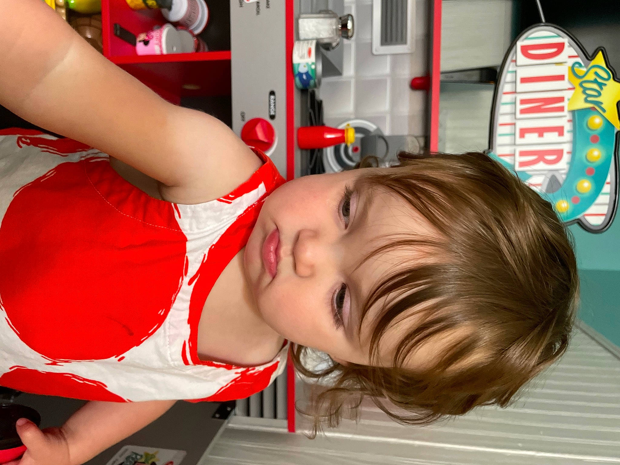 Lillian joined the competition — help win amazing prizes! chair, chest, child, eyelash, fun, happy, human_leg, leisure, mouth, nose, orange, person, play, red, refrigerator, room, skin, smile, thigh, toddler