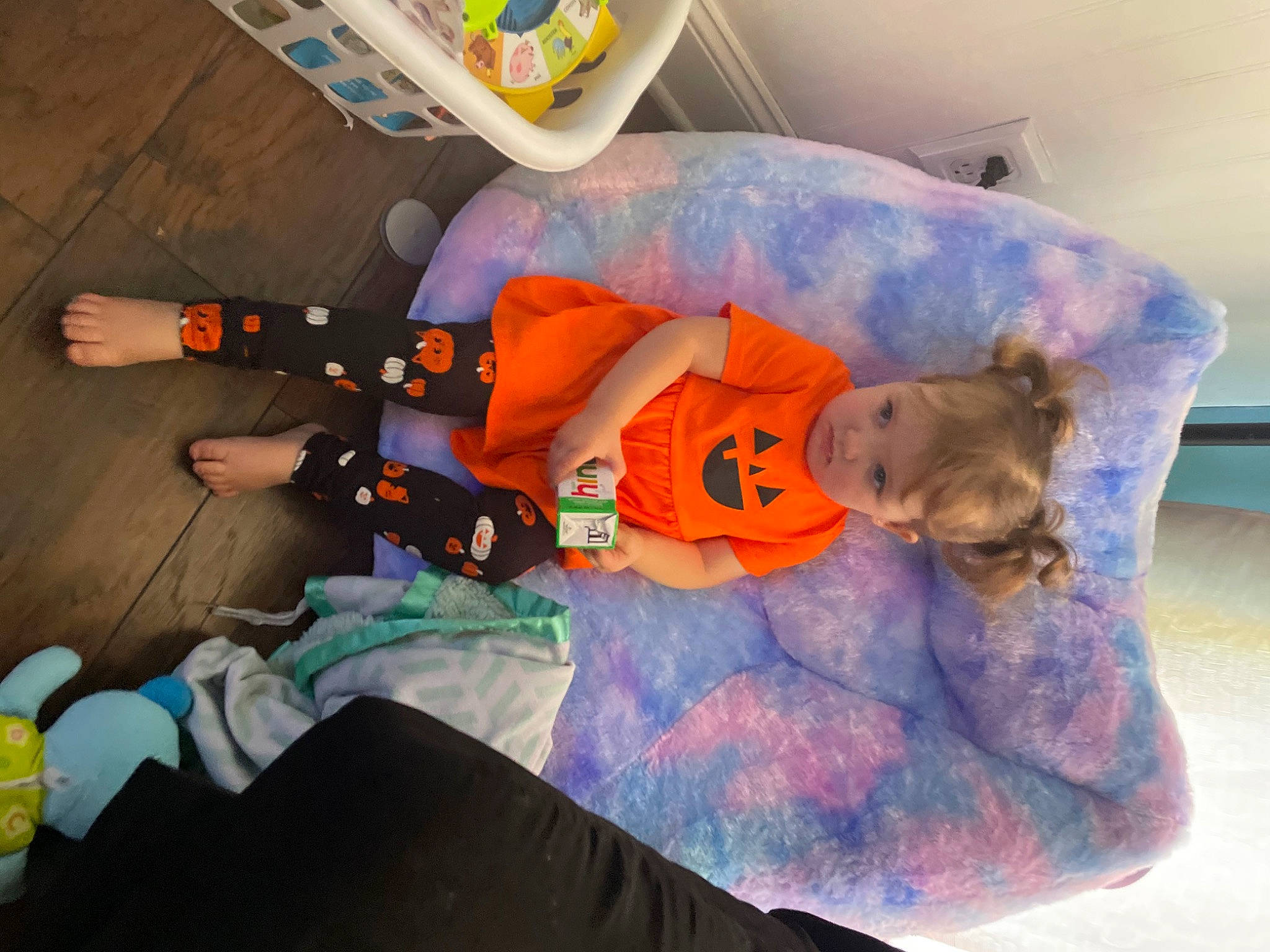 Lillian is registered to the contest to win money with this photo: baby, baby_products, baby_toys, child, costume, fictional_character, fun, games, linens, person, personal_protective_equipment, plastic, play, plush, purple, room, shoe, stuffed_toy, toddler, toy