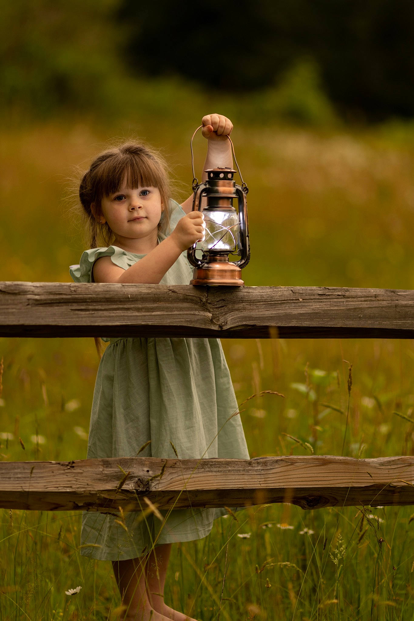 Emily joined the competition — help win amazing prizes! child, drinkware, fawn, fence, fun, grass, grass_family, grassland, happy, landscape, leisure, meadow, people_in_nature, person, plant, recreation, sitting, tableware, toddler, water_bottle