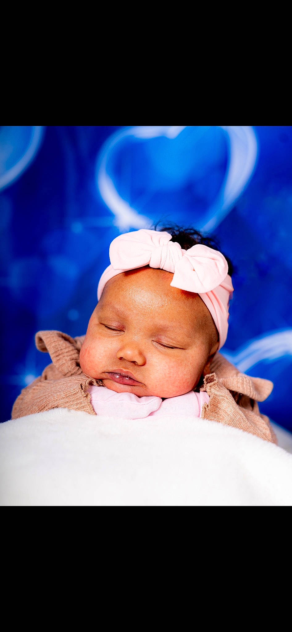 Alayah is registered to the contest to win money with this photo: baby, baby_toddler_clothing, cheek, child, electric_blue, entertainment, event, eyelash, flash_photography, fun, happy, headwear, magenta, person, portrait_photography, toddler