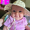 Skyler is registered to the contest to win money with this photo: baby, child, face, hat, smile, purple_clothing, infant, cute, indoors, portrait, closeup, cheeks, person, headwear, happy, young_child, skin, eyes, sitting, soft_focus