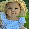baby, child, hat, straw_hat, blue_eyes, dress, ruffles, outdoor, nature, portrait, sunlight, cute, infant, smile, face, person, summer, greenery, young, fashion