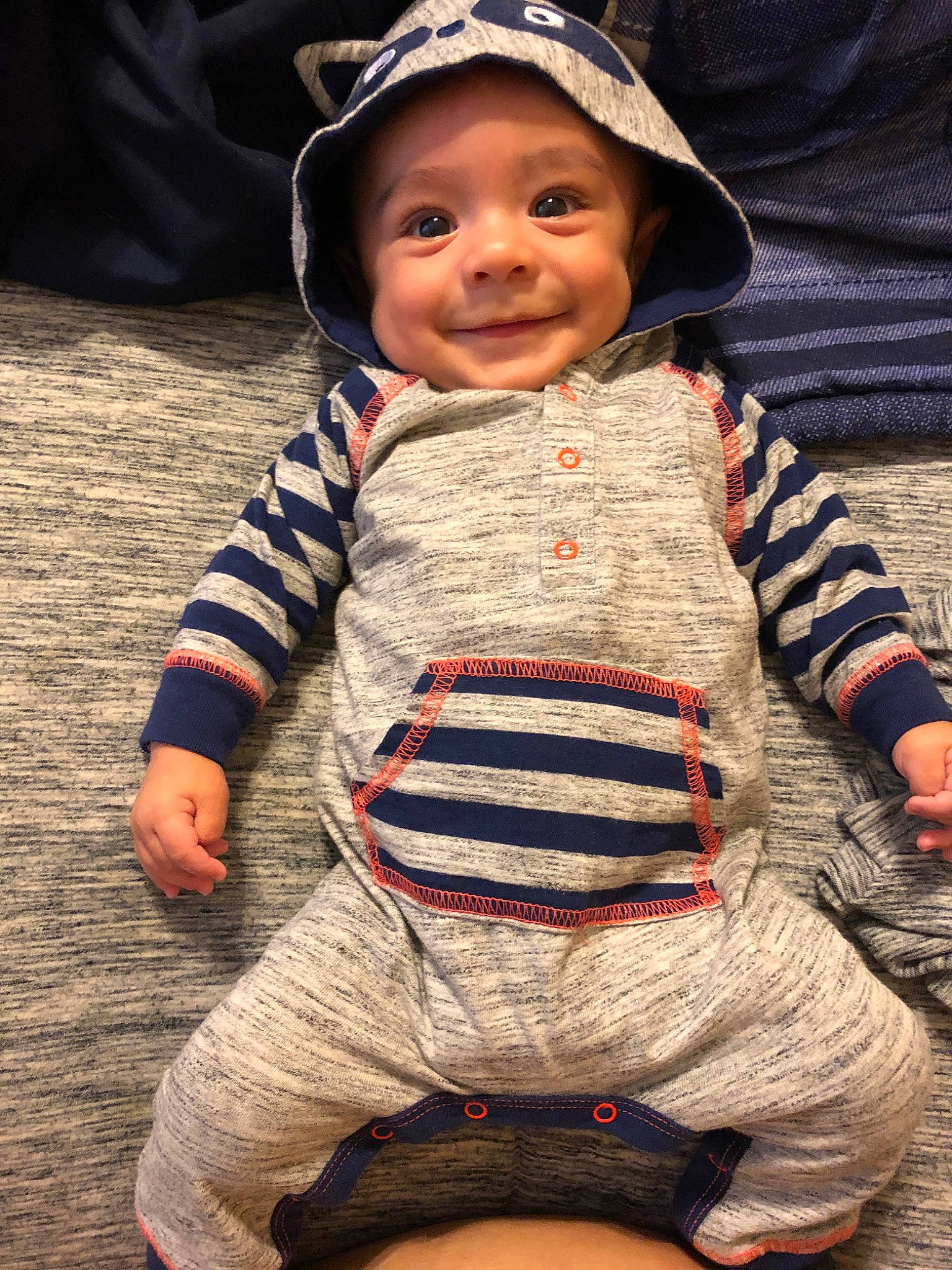 Allen is registered to the contest to win money with this photo: baby, baby_toddler_clothing, cheek, child, cool, headgear, joy, knitting, outerwear, person, sitting, skin, sleeve, smile, sweater, t_shirt, toddler, wool