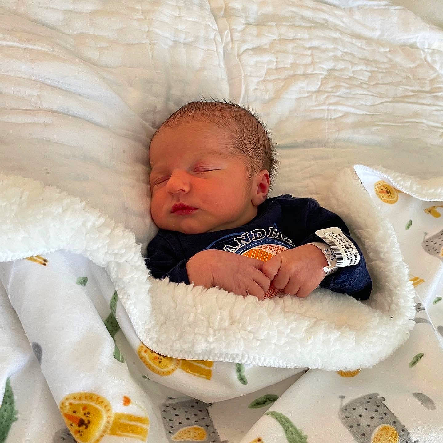 Jaxx is registered to the contest to win money with this photo: baby, baby_products, baby_sleeping, baby_toddler_clothing, bedding, bedtime, cheek, child, comfort, eye, facial_expression, hair, head, linens, person, product, skin, sleeve, textile, toddler