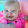 baby, child, smiling, blue_eyes, pink_clothing, floatie, summer, outdoor, cute, happy, closeup, infant, water, pool, skin, person, cheeks, tooth, sleeveless, sunlight