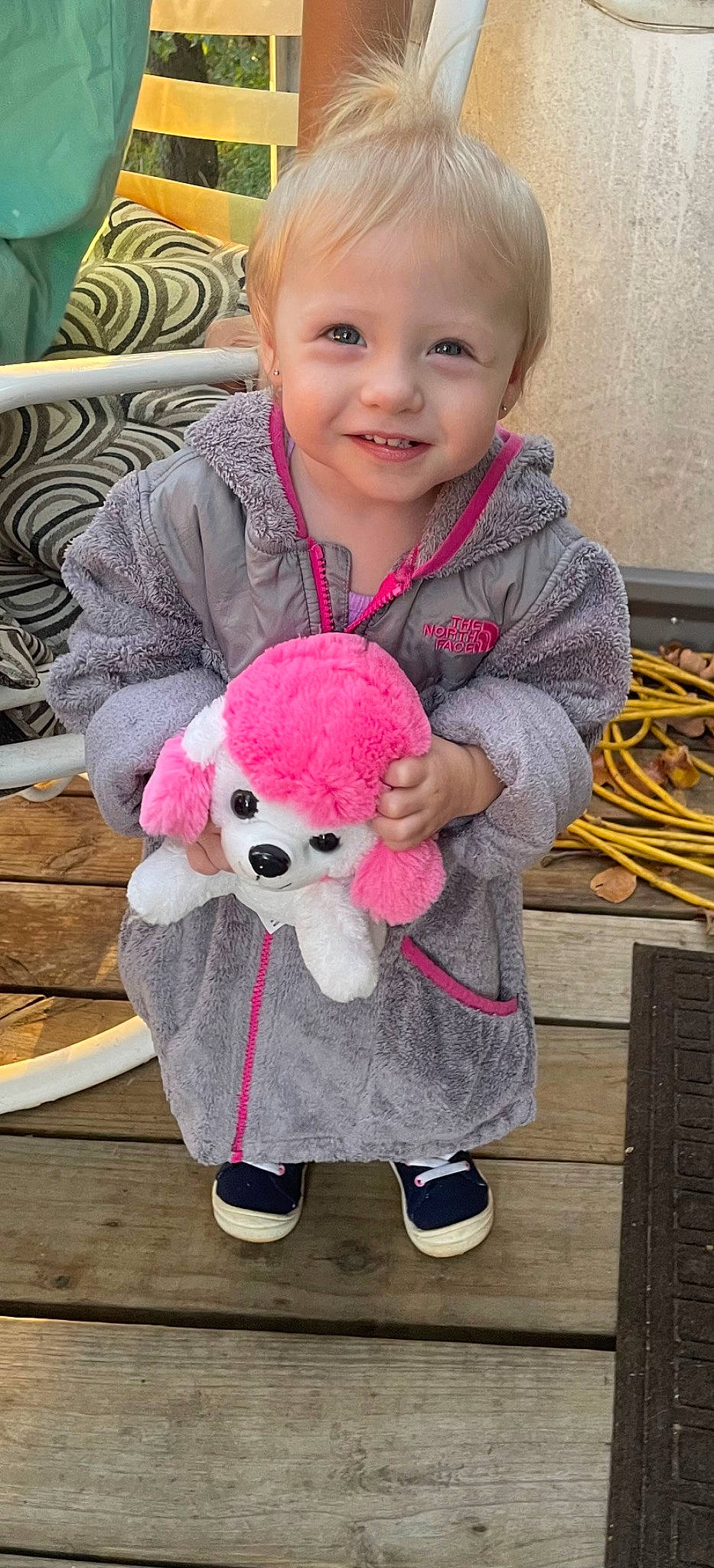 Tonya is registered to the contest to win money with this photo: baby, baby_toddler_clothing, cheek, green, happy, head, headgear, joy, magenta, nose, organ, outerwear, people, person, photograph, pink, skin, sleeve, smile, toddler