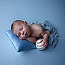 newborn, baby, sleeping, pillow, blue, blanket, baseball, infant, resting, soft, peaceful, child, portrait, studio, caucasian, hand, face, skin, closeup, relaxation