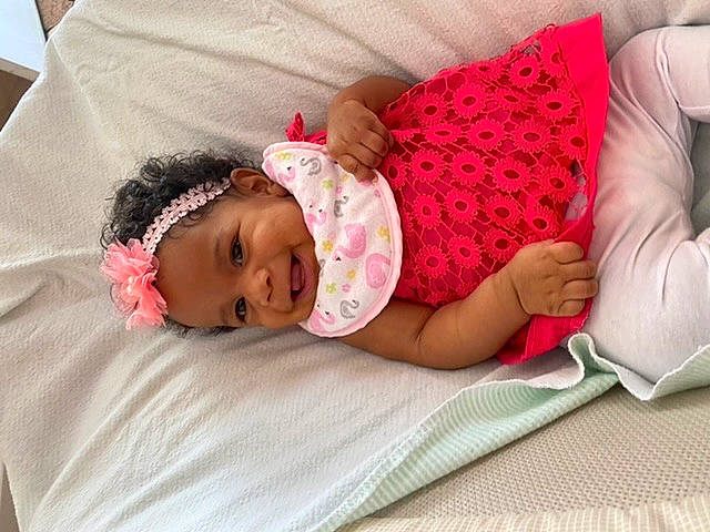 Rilee joined the competition — help win amazing prizes! baby, baby_products, baby_sleeping, baby_toddler_clothing, bedtime, birth, child, fashion_accessory, hair_accessory, headgear, headwear, nap, person, pink, product, skin, sleep, toddler