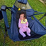 Rubyrae is registered to the contest to win money with this photo: baby, sleeping, onesie, bib, camping_chair, outdoor, grass, greenery, relaxing, infant, child, nature, seat, fabric, napping, peaceful, young, portrait, casual, resting