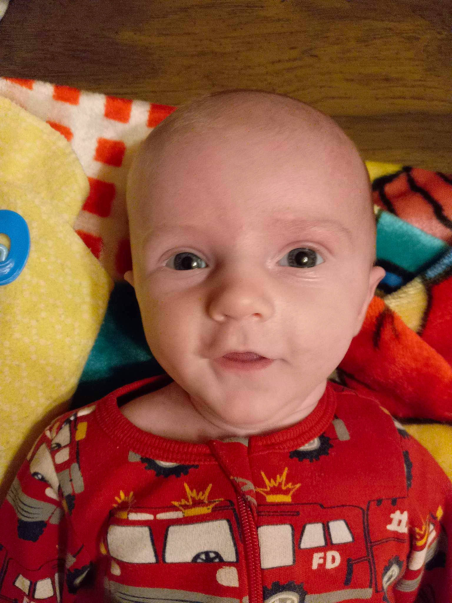 Callahan joined the competition — help win amazing prizes! baby, baby_toddler_clothing, cheek, chin, eye, eyebrow, face, forehead, head, iris, lip, mouth, nose, orange, person, red, skin, sleeve, smile, textile