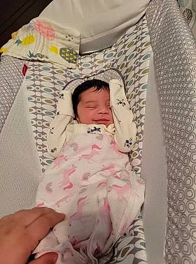 Ariella is registered to the contest to win money with this photo: baby, baby_products, baby_safety, baby_sleeping, baby_toddler_clothing, bed, bedding, bedtime, child, comfort, face, finger, infant_bed, linens, pattern, person, pink, product, sleeve, textile