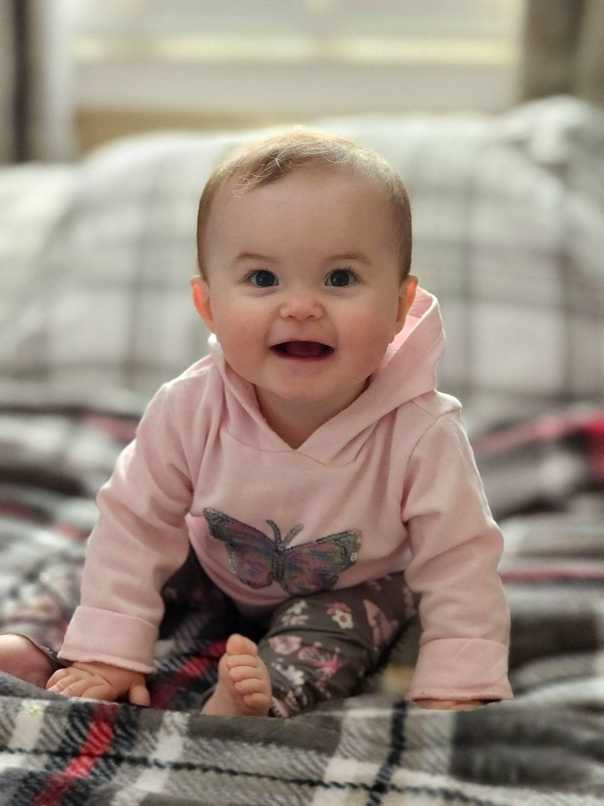 Aarya is registered to the contest to win money with this photo: baby, baby_toddler_clothing, cheek, child, eye, floor, flooring, grass, hairstyle, happy, head, human, iris, joy, pattern, people, person, sitting, skin, smile