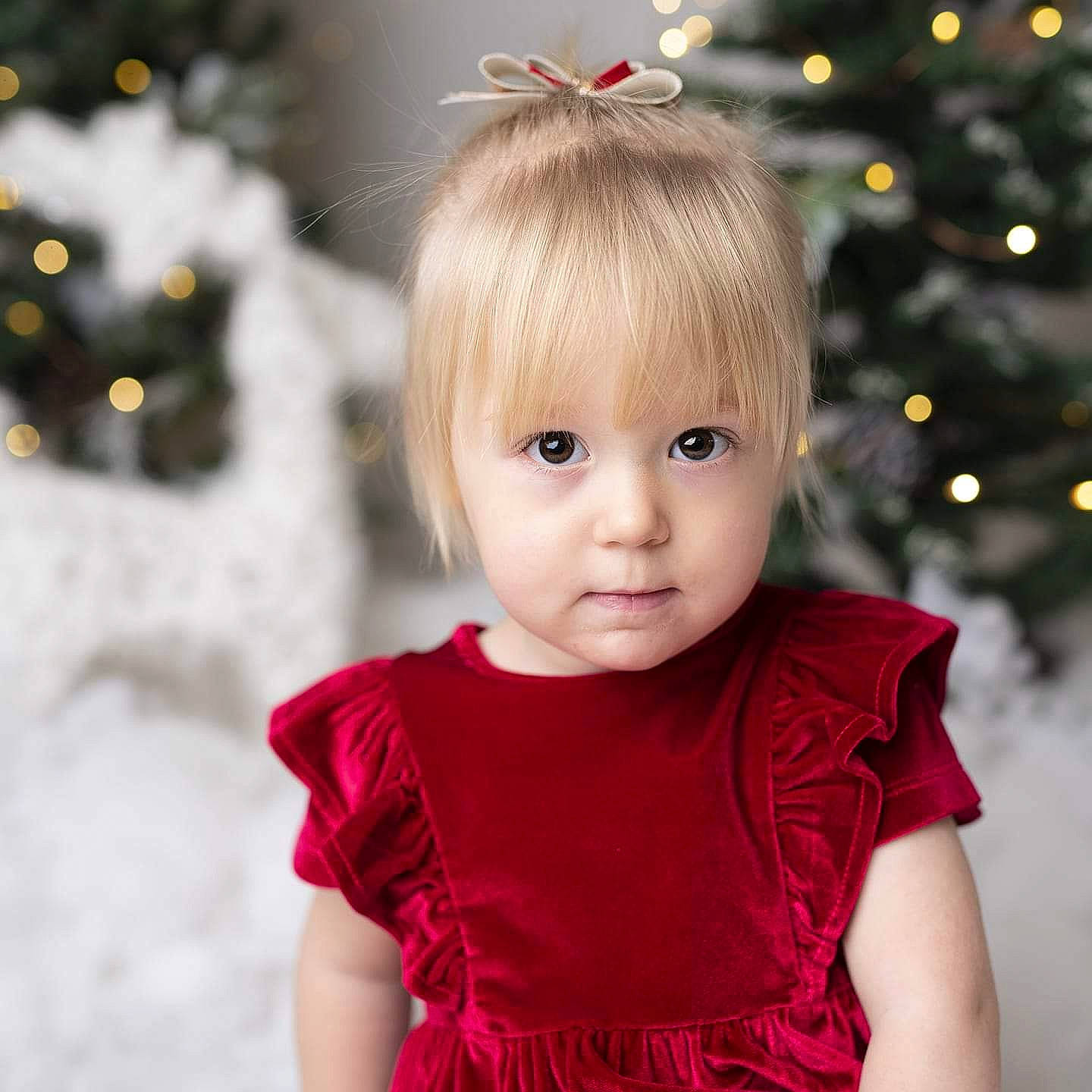 Darcie joined the competition — help win amazing prizes! baby, bangs, blond, brown_hair, child, child_model, christmas, christmas_eve, christmas_tree, hair, hairstyle, happy, head, holiday, person, plant, sleeve, smile, toddler, tree
