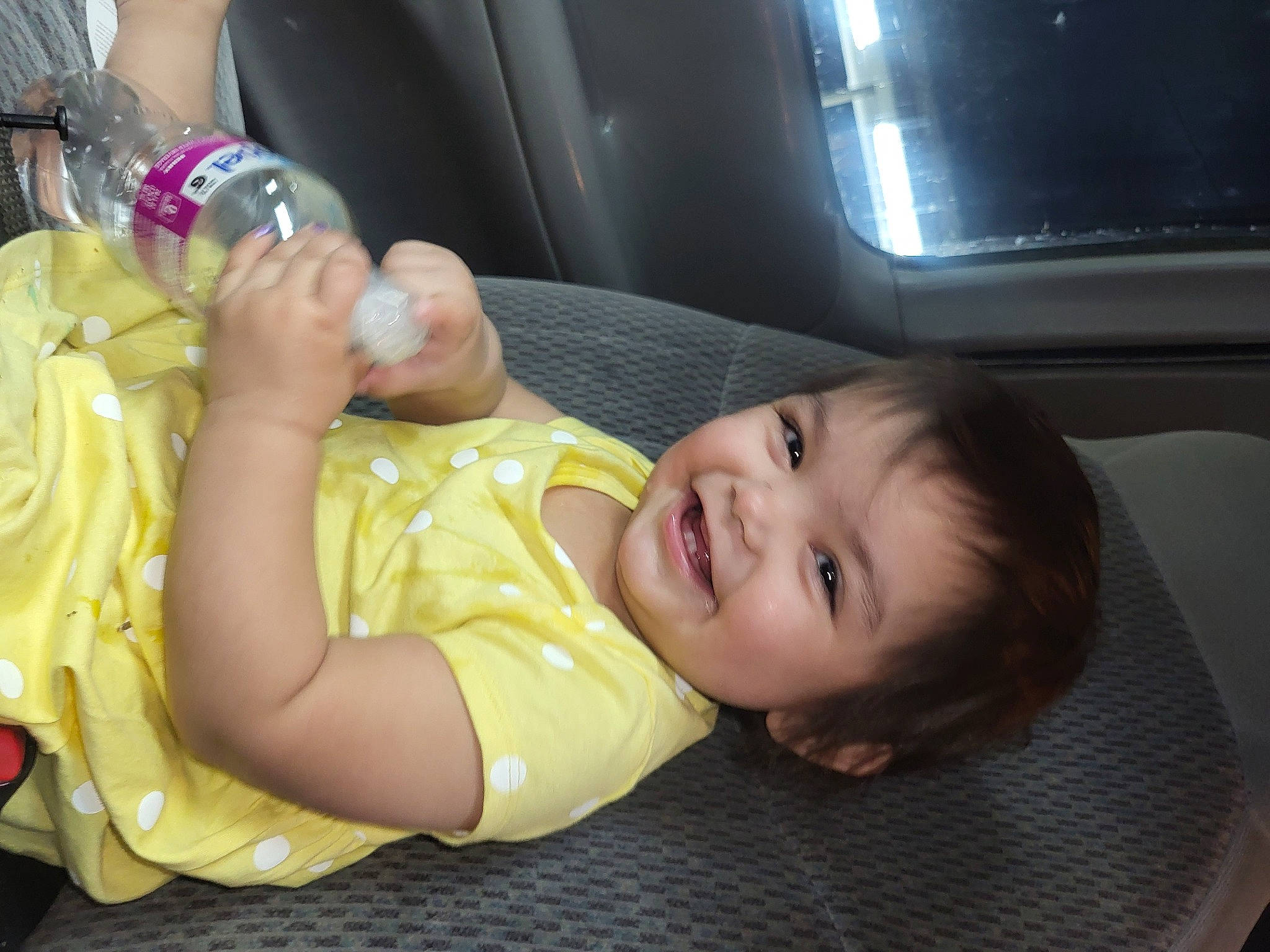 Kailani joined the competition — help win amazing prizes! baby, baby_products, baby_toddler_clothing, car_seat, cheek, child, comfort, family_car, finger, fun, happy, human_leg, joy, lap, mouth, person, sitting, smile, thigh, thumb