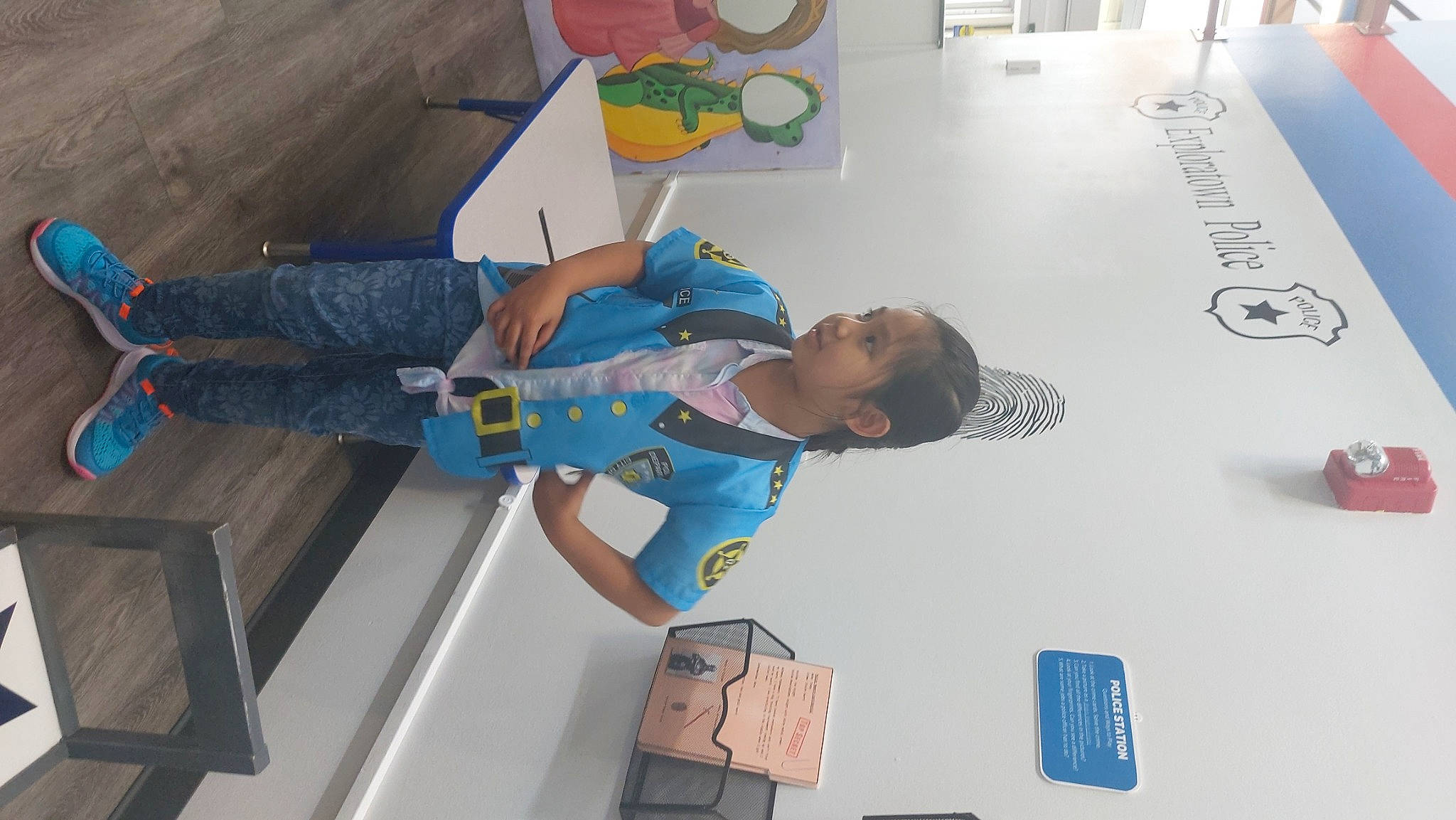 Challanie is registered to the contest to win money with this photo: art, chair, child, flooring, fun, leisure, machine, person, room, space, t_shirt, toddler, visual_arts