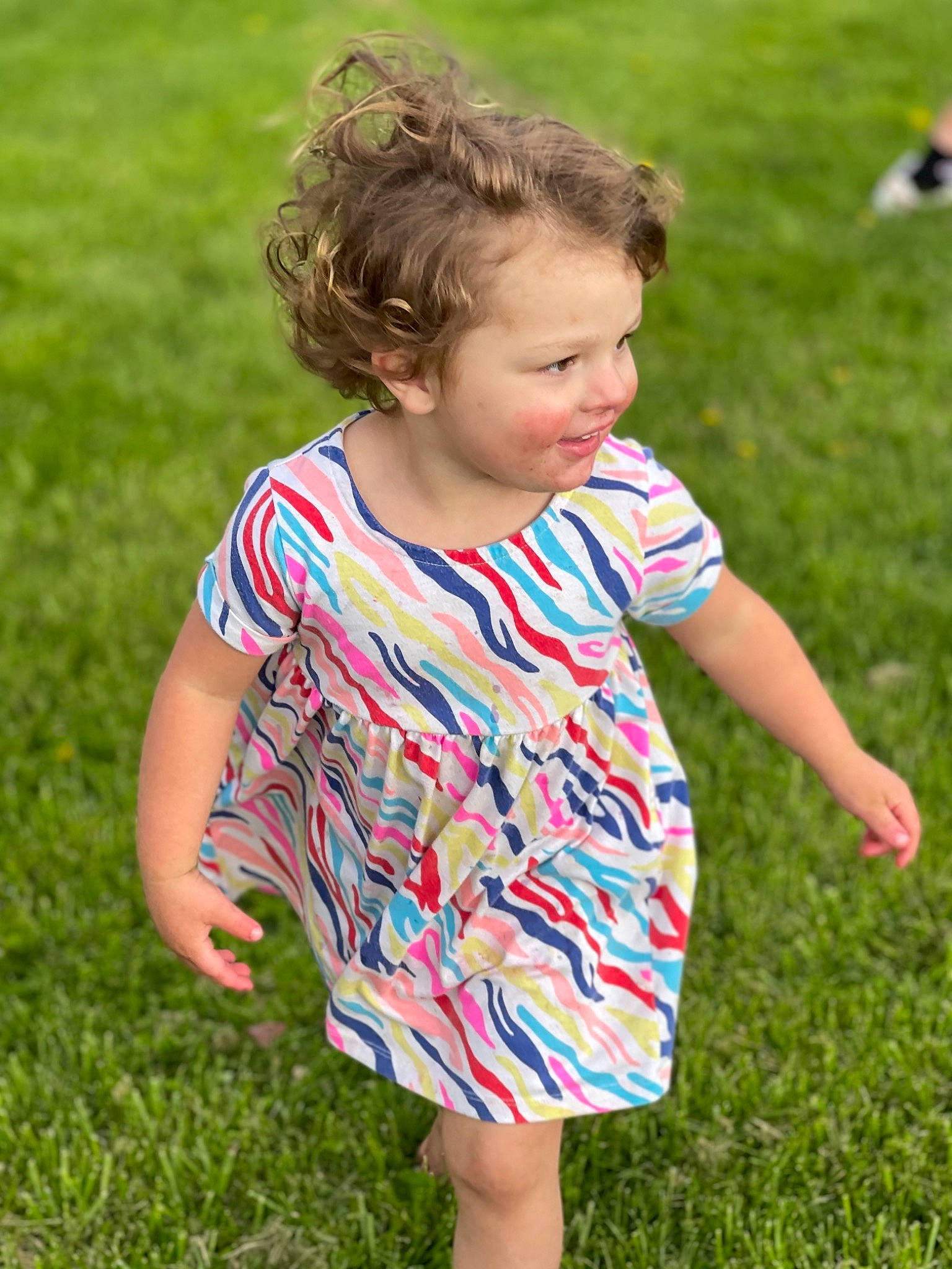 Paislei joined the competition — help win amazing prizes! baby_toddler_clothing, botany, dress, fun, grass, grass_family, grassland, hair, hairstyle, happy, lawn, leisure, meadow, one_piece_garment, people_in_nature, person, plant, sleeve, standing, t_shirt