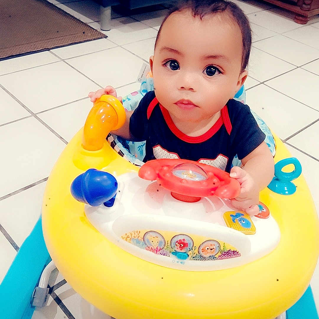 Jacob is registered to the contest to win money with this photo: animal, baby, bodypart, canine, couch, dog, face, finger, furniture, hand, head, homedecor, person, pet, photography, playarea, portrait, rug, sitting, toy