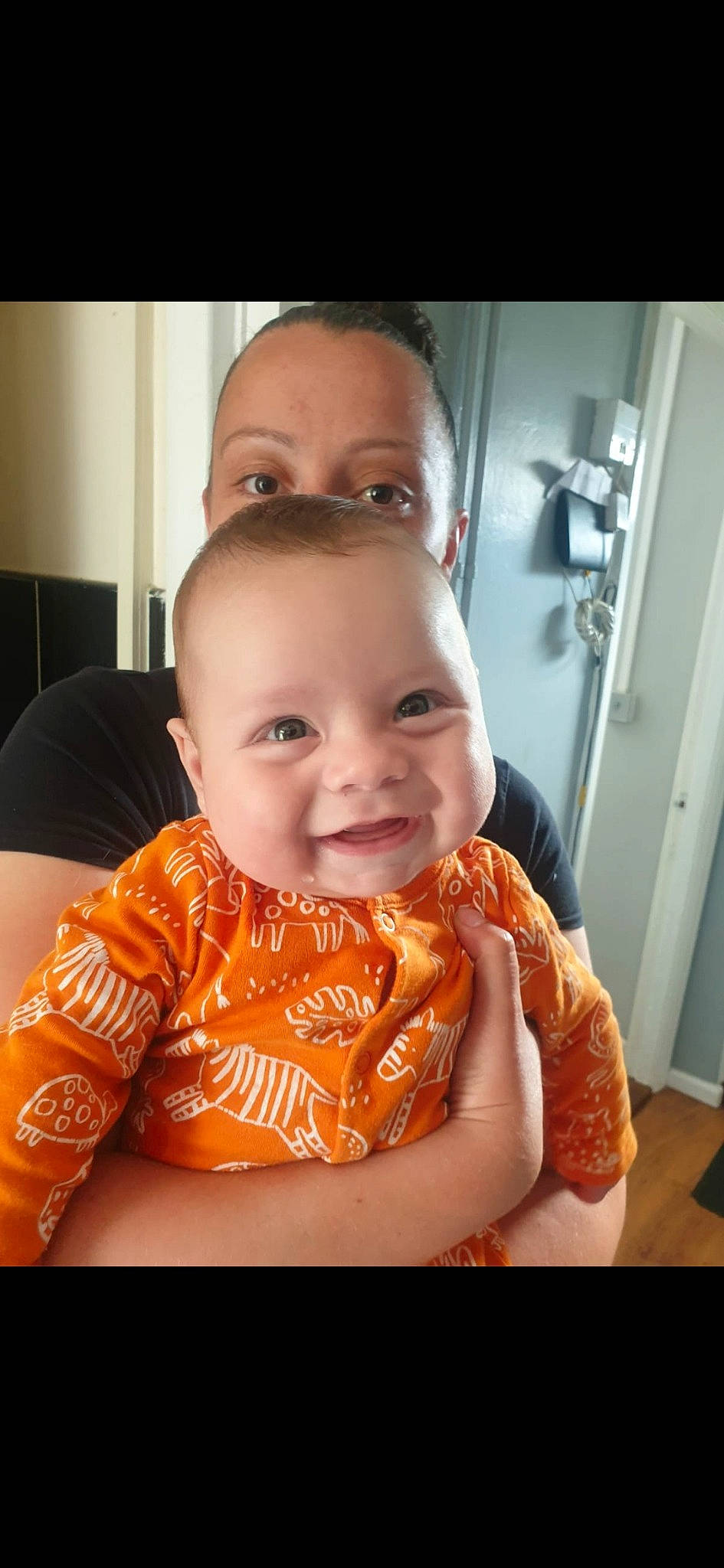 Devyn joined the competition — help win amazing prizes! baby, baby_toddler_clothing, cheek, chin, comfort, door, flash_photography, gesture, happy, iris, joy, lip, mouth, neck, nose, person, skin, sleeve, smile, t_shirt