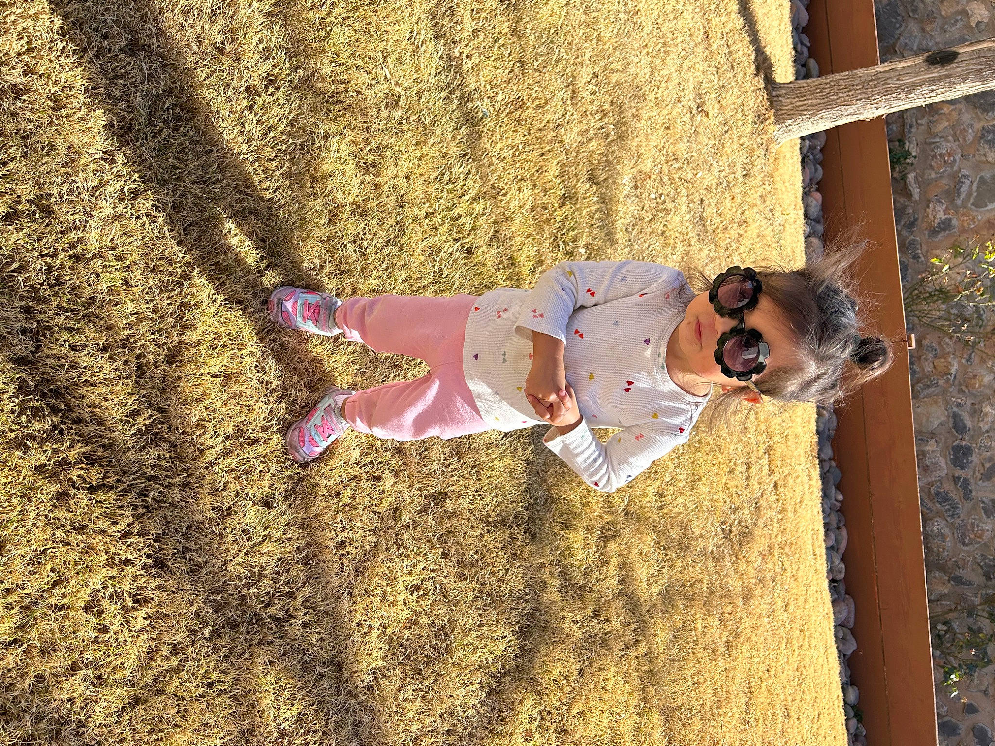 Maya joined the competition — help win amazing prizes! child, fun, goggles, grass, happy, hat, landscape, leisure, magenta, person, shadow, soil, sunglasses, toddler, tree, wood