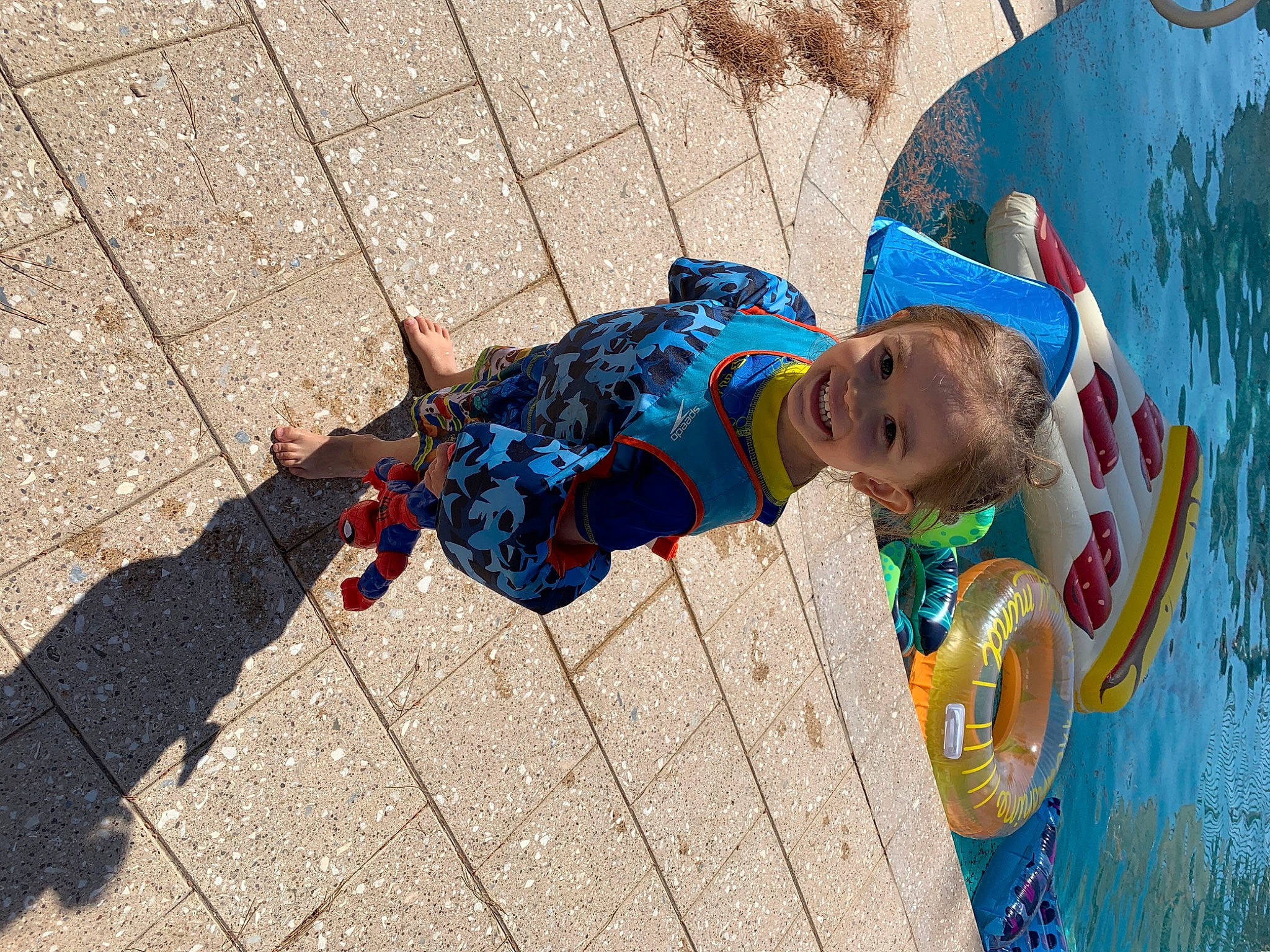 Landon joined the competition — help win amazing prizes! child, concrete, electric_blue, flooring, fun, happy, hat, joy, leisure, people_in_nature, person, play, recreation, road_surface, sand, sidewalk, smile, toddler, tree, wall